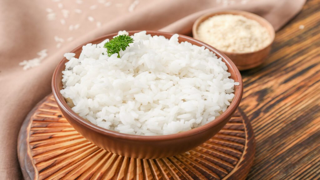 Medium grain rice cooked with soft fluffy grains and slight stickiness in a bowl