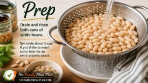 Cannellini white beans being drained and rinsed in a colander before making Creamy Tuscan White Bean Skillet.